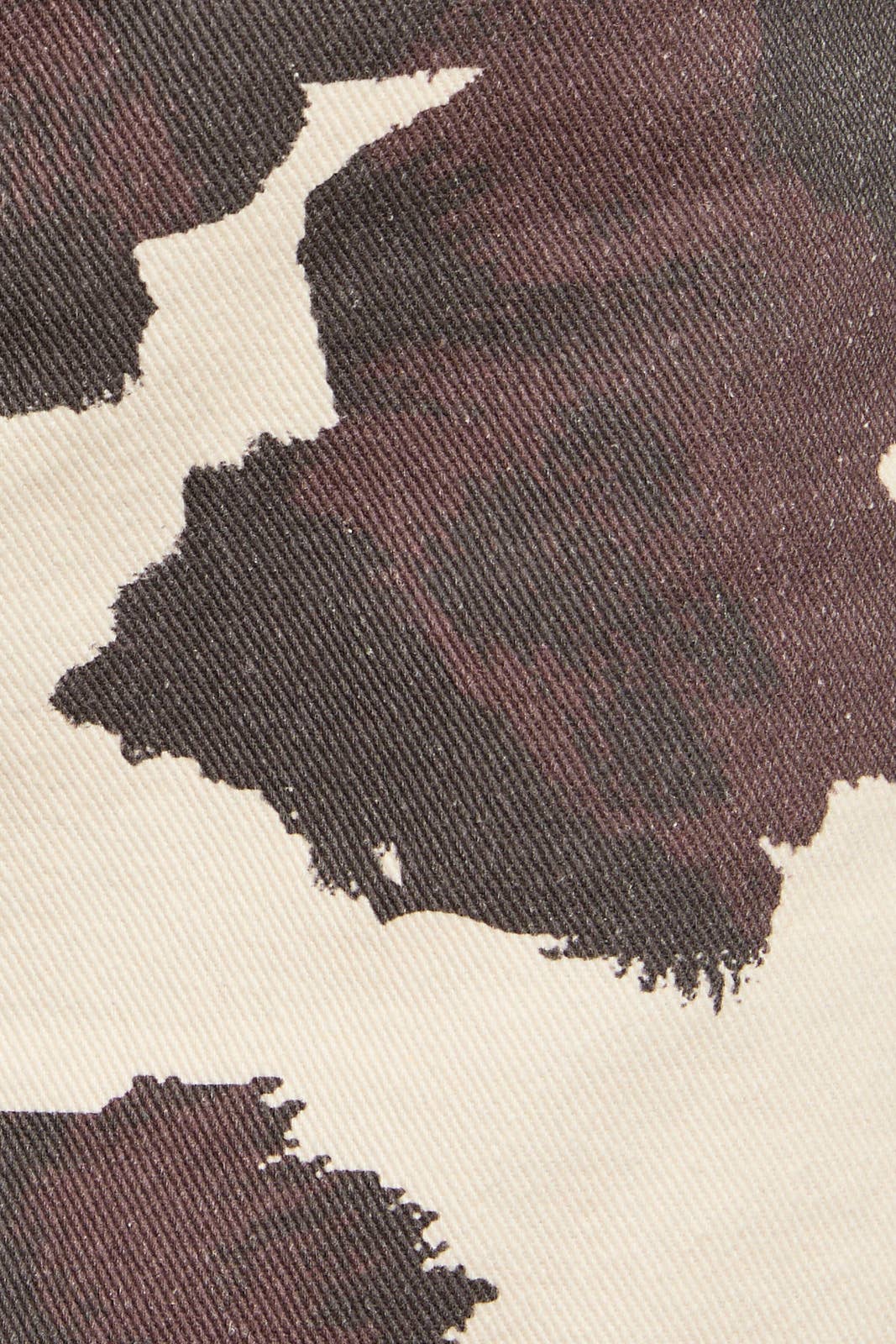 COW PRINT MINI SKIRT