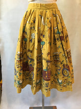 Load image into Gallery viewer, 1950s Cotton Print Skirt, mustard with purple and turquoise details, size Small